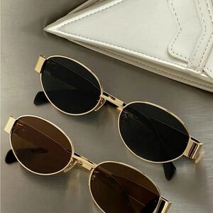 Gold and Black Oval Sunglasses